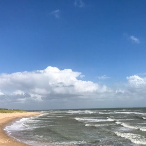 Sandy beach and blue sky near Sainte Marie de Ré village