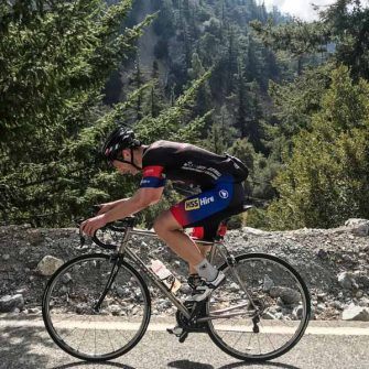 Cyclist climbing the last few kilometres of Mount Baldy Rd