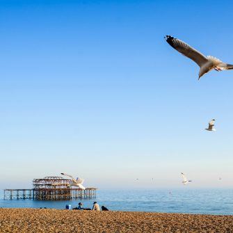 Old Brighton pier, with a blue sky