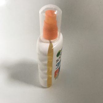 Side view of ambre solaire sunscreen 