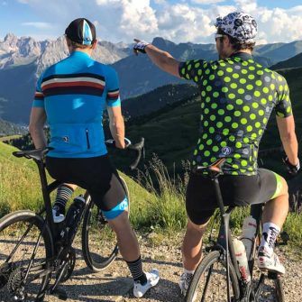 Two male cyclists wearing Stolen Goat bib shorts