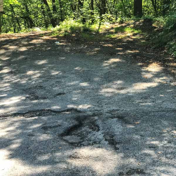 Pot hole in the climb after Lake Maggiore on the UCI Gran Fondo World Championships road race 2018
