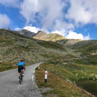 Cyclist nearing the summit of the Gavia Pass cycling climb