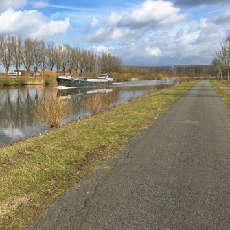 Canal bike path for cyclists near Oudenaarde, Flanders, Belgium
