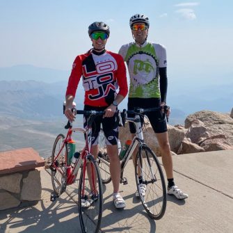 Cyclists who have cycled to the top of Mount Evans Summit Colorado