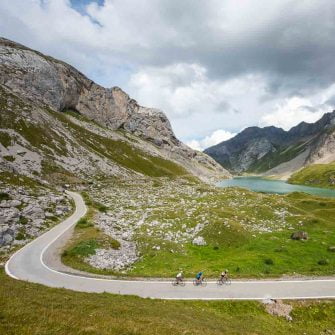 Cyclists climb the Sanetsch Pass, Switzerland