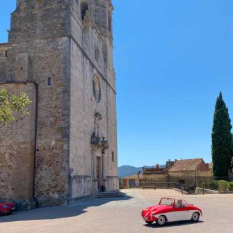 Church at Llagostera with car in front