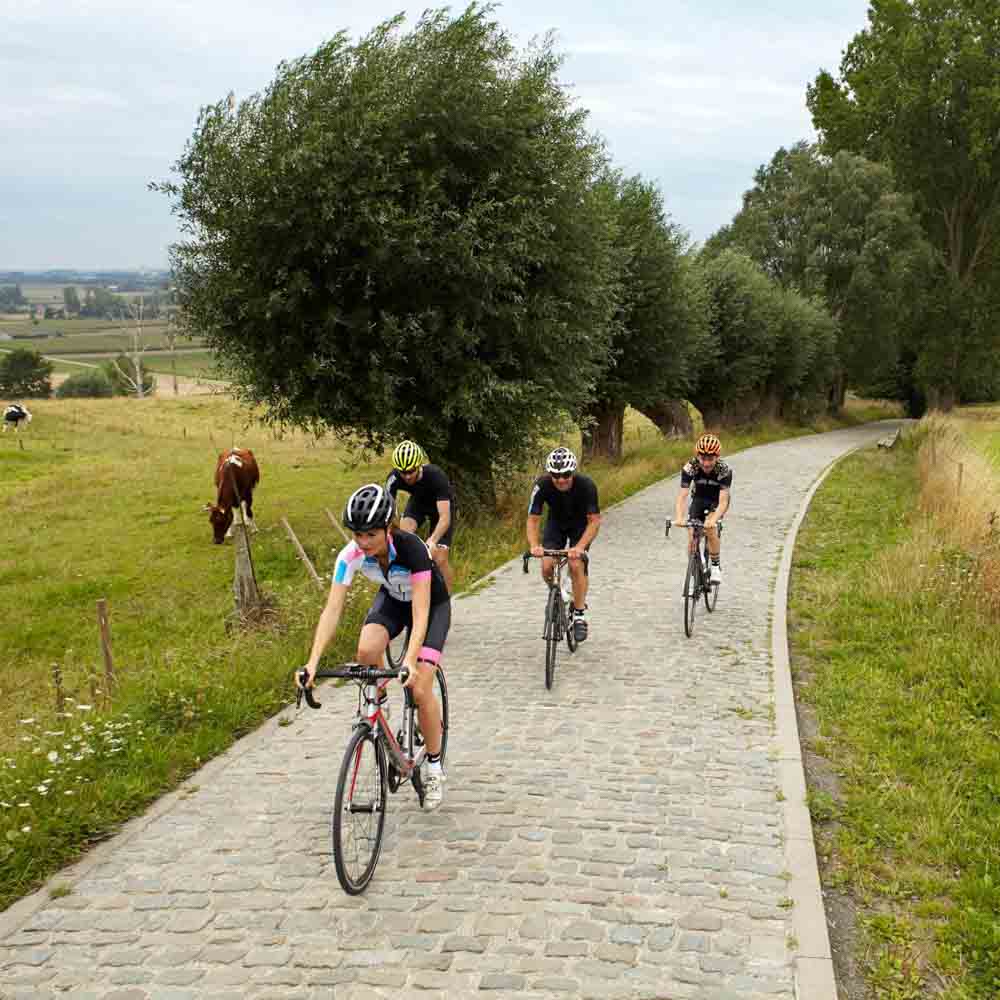 Four cyclists in the villages of Belgium cycling holidays